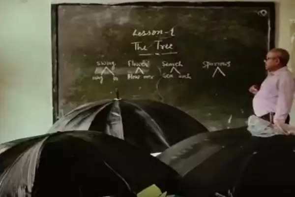 Children studying with umbrella in class, order to investigate the matter
