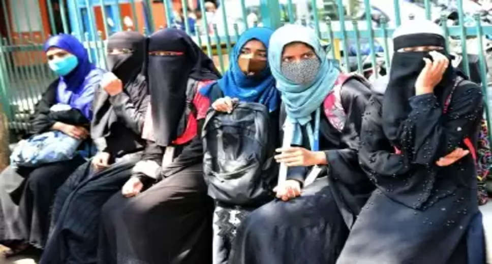 A student of Malleshwaram Pre University College, who was insisting to be allowed to write examination wearing burqa, was counselled by principal after which she agreed to remove it and appeared for the exam, here on Thursday.  The board exams for the Class 12 students have commenced across the state.  Students have appeared for their exams for Kannada and Arabic subjects.  The student was insisting till the last minute that she should be allowed to write exams wearing hijab. Though authorities rejected her requests, the student remained adamant. However, the Principal, who was on examination duty, spoke to the student and told her about the rules.  He also told her how important it is for her to write exams, after which she agreed to remove it, sources in education ministry stated.  Education Minister B. C. Nagesh has said many times that students wearing hijab or any attire which symbolises religion will not be allowed to write exams.