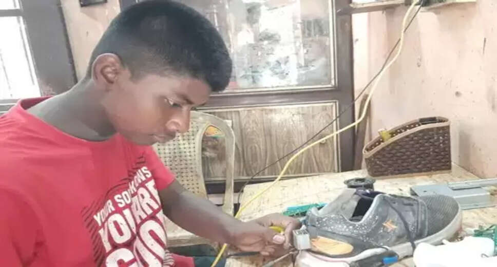 Souvik Seth, a class 9 student of Barasat Depara, Chandannagar, Hooghly invented a shoe that generates electricity when you walk with them on. Everything can be charged from mobile, GPS tracking to cameras with that electricity. His interest in electronics started from watching his uncle work on electronics while studying in fifth grade. This student of the English department of Chandannagar Kanailal School has already received several science display awards. Souvik claims that electricity can be generated by walking with shoes on. A 2000 mAh battery will charge easily. This battery will be charged only by walking for one kilometer. For now, this smart shoe system is done externally. Within a month all the gadgets will be built into the sole of the shoe. And for this, a shoe manufacturing company is needed that could help Souvik financially. The inventor believes that it will bring a new direction in the world of shoes. As a result, travellers who are out on a trip or mountain climbing will be benefitted. Souvik says, “I made this smart suit from discarded items. These shoes have a GPS system which is very convenient for children. It takes a long time to find a child if they go missing. But if this is worn, they can be easily found. Not only this, family members can see where their children are. The shoes are equipped with spy cameras. It can easily be seen if there is a suspicious person around. However, there is no way that the suspicious person will realize that the child has a camera attached to his or her shoe. Walking creates kinetic energy and from that this electricity is generated. Many times it will be very convenient for those who step on the hill.” If any big company contacts him, he says his work will be worthwhile. Souvik’s father Swaroop Seth is a jute mill worker. His mother Soma Seth said, “When he was studying in the fifth standard, he used to watch the work of Chinese Light with his uncle. This is where his wish comes from. First, a bicycle calling bell is fashioned out of discarded materials. Later developed a spy suit, which included navigation with a camera. It costs a lot to make.” He is willing to study ITI in the near future.